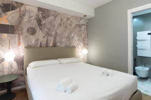 Koupelna v ubytování Maison Rasella Palace Suites + 37 fotografií