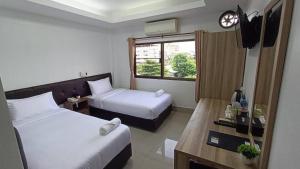 Postel nebo postele na pokoji v ubytování Rimnam Hotel Suk Sawat 70 + 161 fotografií