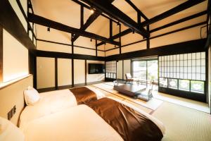 Llit o llits en una habitació de happoya