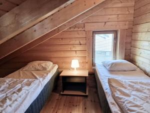 Postel nebo postele na pokoji v ubytování Villa Kastanja & Persikka - 16 hlö, Molemmat puolet, Both sides, Himoslaakso Ski-inout + 18 fotografií