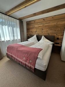 Postel nebo postele na pokoji v ubytování Klamm Lodge