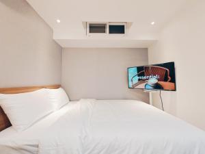 W hostel的电视和/或娱乐中心