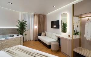 Postel nebo postele na pokoji v ubytování Aeolian Spirit Suites