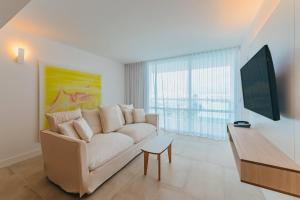 TV a/nebo společenská místnost v ubytování Radisson Blu Aruba