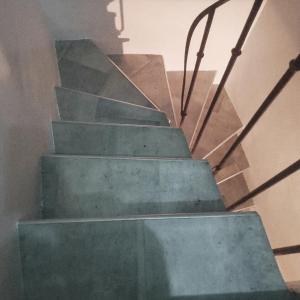 a set of stairs in a building with at Escapade cœur de ville Narbonne in Narbonne