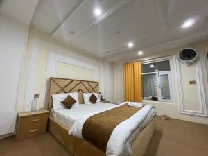 Postel nebo postele na pokoji v ubytování Royal fort resort skardu