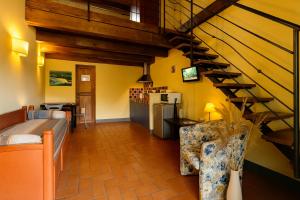 TV a/nebo společenská místnost v ubytování Agriturismo Trerè