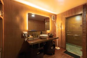 a bathroom with a sink and a mirror at Pondanu Living in Bedugul +83 photos
