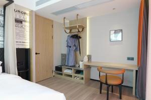 Arthur Hotel Baiyun Guangzhou客房内的一张或多张床位