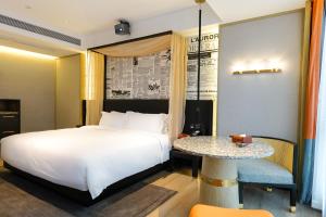 Arthur Hotel Baiyun Guangzhou客房内的一张或多张床位
