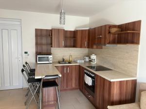 Kuchyňa alebo kuchynka v ubytovaní Kohl Wellness Apartman