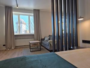 Postel nebo postele na pokoji v ubytování Apartment with Narva Castle view
