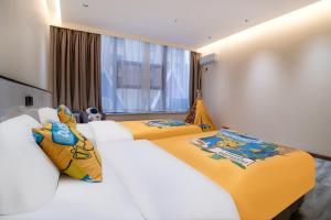 Ένα ή περισσότερα κρεβάτια σε δωμάτιο στο YUNNEST Hotel +23 φωτογραφίες