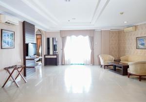 Posezení v ubytování Travellers Suites Serviced Apartments
