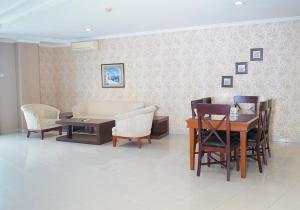 Posezení v ubytování Travellers Suites Serviced Apartments