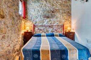 Ένα ή περισσότερα κρεβάτια σε δωμάτιο στο Rosa - Agriturismo Fogliani
