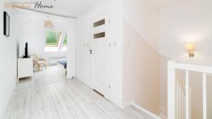 Łóżko lub łóżka w pokoju w obiekcie Wonder Home - Apartament blisko Ski Arena, szlaków turystycznych i Kościółka Wang