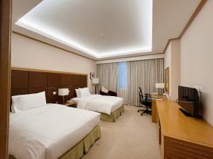TV a/nebo společenská místnost v ubytování Hilton Garden Inn Hanoi