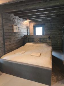 Postel nebo postele na pokoji v ubytování Tiny House Scheveningen