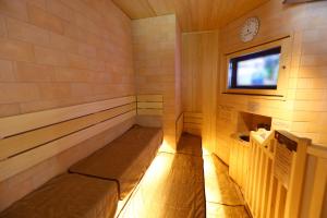 a small room with two beds in a sauna at Onyado Nono Matsumoto Natural Hot Spring in Matsumoto