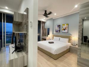 Postel nebo postele na pokoji v ubytování Encorp Marina Suites by Nest Home at Puteri Harbour + 37 fotografií