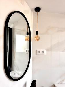 Ein Badezimmer in der Unterkunft First line with ocean views
