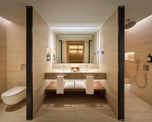 a bathroom with a sink and a mirror at XO CAPE ARNNA Fethiye in Fethiye
