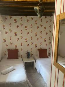Postel nebo postele na pokoji v ubytování Villa Thermopilon