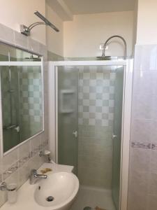 Koupelna v ubytování Hotel Astor