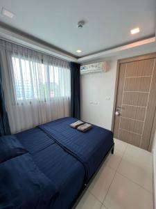 Una cama o camas en una habitación de Arcadia continental By Pam 6 fotos más