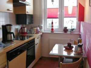 Kuchyň nebo kuchyňský kout v ubytování Residenz Falkenberg Wohnung ,,Seeadler'' + 3 fotografie