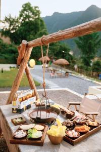 a buffet of food on a table at a resort at Hallelujah Heights Retreat in Zhangjiajie