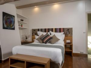 Llit o llits en una habitació de L'Hostalet