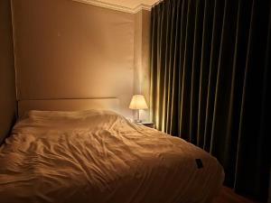 เตียงในห้องที่ Dongdaemun Myeongdong 6BED