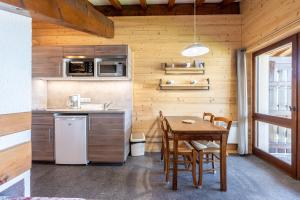 Кухня или мини-кухня в Studio 17 - Le Tetras
