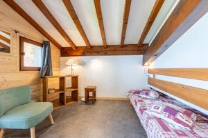 Кровать или кровати в номере Studio 17 - Le Tetras