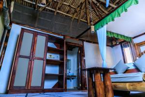 Una cama o camas en una habitación de Samburu Elephant Lodge