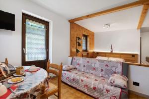 Posezení v ubytování Maison Le Cré Appartamento 2