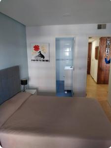Кровать или кровати в номере Bonito Apartamento en la Nogalera