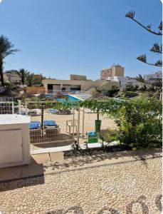 Бассейн в Bonito Apartamento en la Nogalera или поблизости