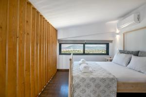 Ένα ή περισσότερα κρεβάτια σε δωμάτιο στο Green Hill Lefkada Maisonette +22 φωτογραφίες