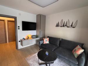 Televízia a/alebo spoločenská miestnosť v ubytovaní Apartments Jakobi by El-Pi Tours