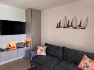 Televízia a/alebo spoločenská miestnosť v ubytovaní Apartments Jakobi by El-Pi Tours