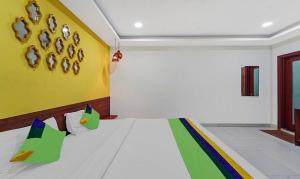 Signature Grande Pondicherry客房内的一张或多张床位