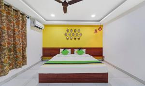 Signature Grande Pondicherry客房内的一张或多张床位