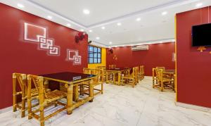 Signature Grande Pondicherry的电视和/或娱乐中心