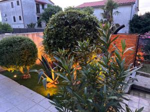 Vonkajšia záhrada v ubytovaní Apartments Jakobi by El-Pi Tours