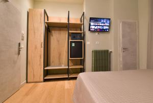 Posteľ alebo postele v izbe v ubytovaní Hotel Columbia
