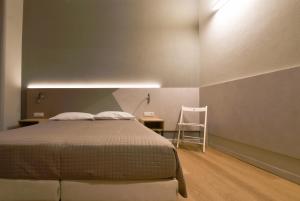 Posteľ alebo postele v izbe v ubytovaní Hotel Columbia