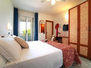 Postel nebo postele na pokoji v ubytování Dasamo Hotel - Dada Hotels + 37 fotografií